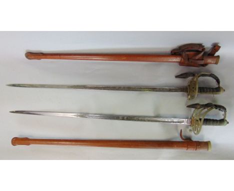 Two George V Army officers swords, Oxford and Bucks regiments, the blades by Wilkinson numbers 48161 and 48188 with leather s
