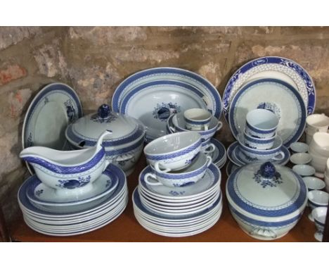 A quantity of Danish dinner wares with blue painted floral detail and basket weave border including oval meat plates, tureen 