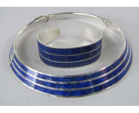 A silver and lapis lazuli demi parure comprising articulated collar necklace and bangle 