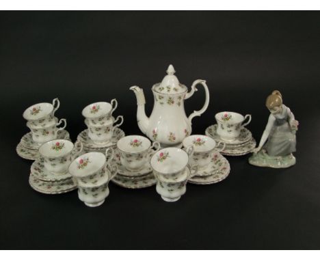 A collection of Royal Albert Winsome pattern tea and coffee wares comprising coffee pot, twelve cups, eleven saucers and twel