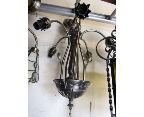 A contemporary three branch brushed metal hanging ceiling light with Tiffany style leaded drop shades, together with one othe