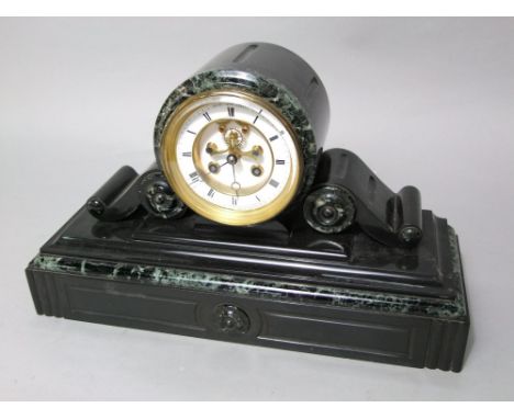 A 19th century black slate drum head mantle clock, with scrolled green veined marble decoration, the two train, 10cm dial wit