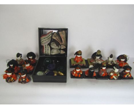 A mixed Japanese lot to include a collection of ceramic dolls making up a band, a lacquered box fitted with further lacquered