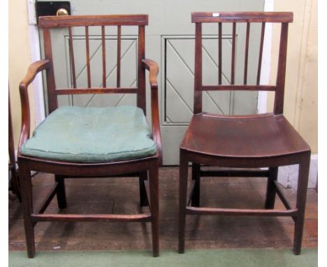 A set of eight (6+2) Georgain mahogany country made stick back dining chairs with dished seats and reeded framework