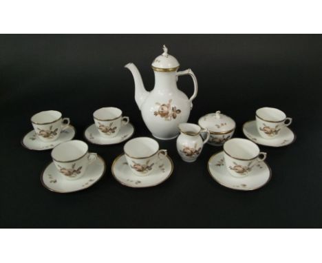 A six place Royal Copenhagen coffee service with brown and gilt floral detail, including coffee pot, milk jug, cover sugar bo