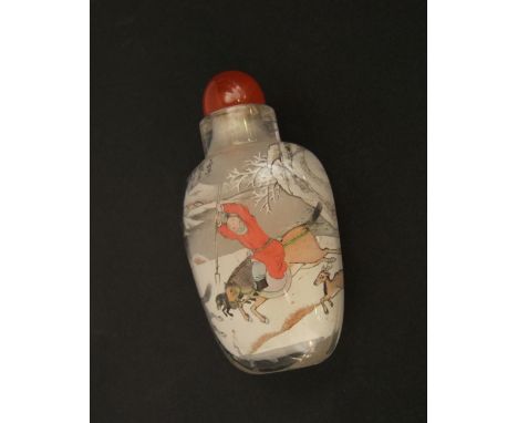 Chinese snuff bottle with painted intaglio winter hunting scene, signed