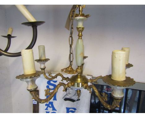 An onyx and cast gilt metal five branch hanging ceiling light