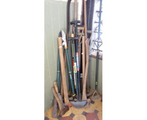 A collection of mainly contemporary long-handled gardening related hand tools