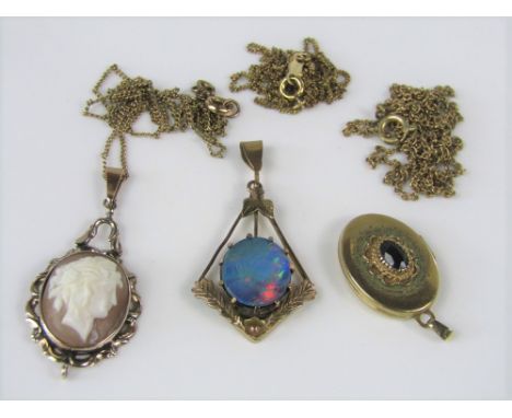 An art nouveau style opal pendant in yellow metal, together with a 9ct sapphire set locket and a cameo necklace, etc