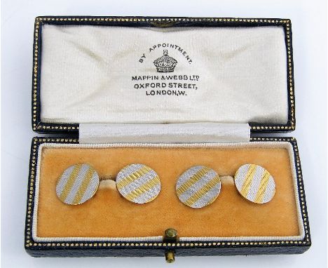 A pair of 18ct gold and platinum cufflinks with striped engine turned decoration, in Mappin &amp; Webb fitted case, 8.2g tota