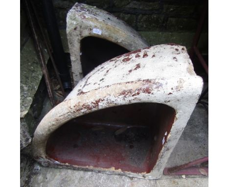 A pair of 19th century salt glazed stoneware corner stable feeding troughs with later painted finish, stamped Oates & Green L