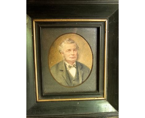 Early 20th century school - Bust portrait of a gentleman in bow tie and suit, work on ivory, oval mount, 8.5 x 6.75cm, framed