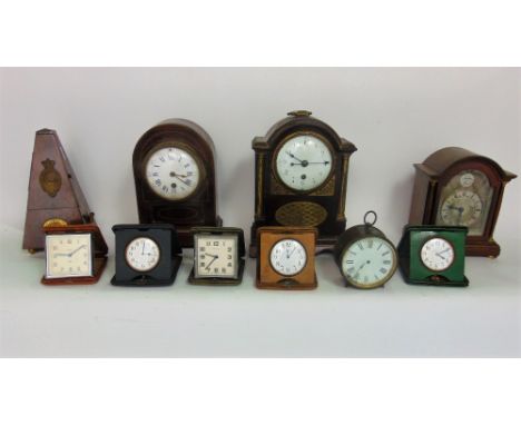 A mixed collection of horology to include five folding travel clocks, to include a Mappin & Webb example, a Metronome and thr