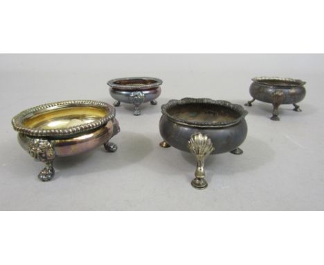 Early George III circular table salts, upon scallop shell hoof feet, maker D & R Hennell, hallmarks indistinct; together with