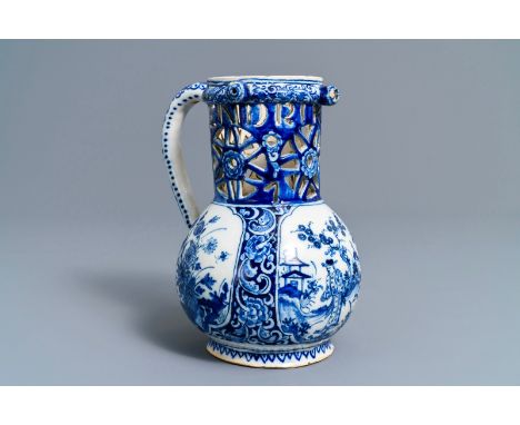 A Dutch Delft blue and white chinoiserie puzzle jug, dated 1743: H.: 21 cm - L.: 19 cm  The blue-grounded neck pierced with t