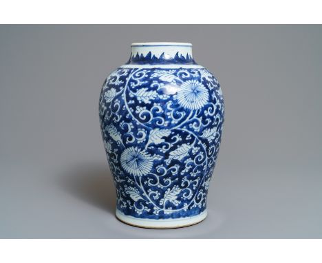 A Chinese blue and white 'peony scroll' vase, Kangxi ----- H.: 34 cm  -----  Condition reports and high resolution pictures a