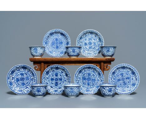 Six Chinese blue and white cups and saucers with floral design, Kangxi: Dia.: 11 cm (the saucers) Dia.: 6,5 cm - H.: 4 cm (th