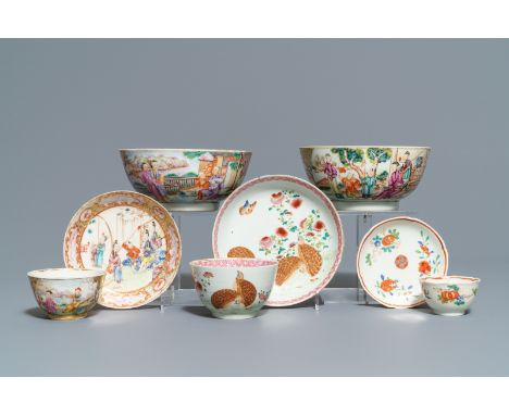 Two Chinese famille rose 'mandarin' bowls and three cups and saucers, Qianlong: Dia.: 14 cm (the largest saucer) Dia.: 9 cm -