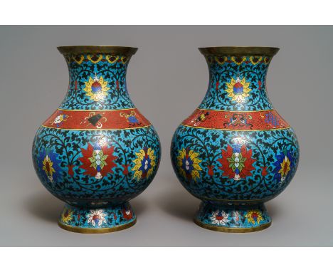 A pair of Chinese cloisonné 'lotus scroll' hu vases, 18th C.H.: 34 cmCondition reports and high resolution pictures are avail