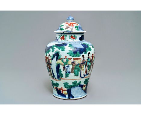 A Chinese wucai baluster vase and cover with playing boys, Transitional period ----- H.: 41 cm  -----  Condition reports and 