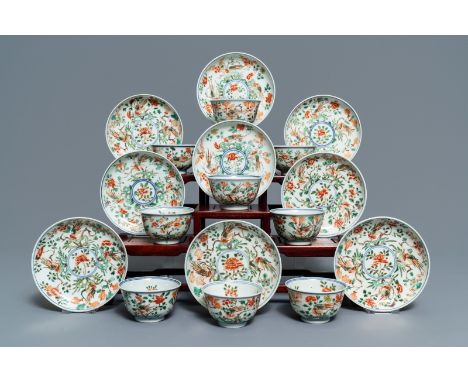 Nine Chinese famille verte cups and saucers, Kangxi: Dia.: 12 cm (the saucers) Dia.: 7,5 cm - H.: 4,5 cm (the cups)  -----  C