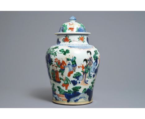 A Chinese wucai baluster vase and cover with playing boys, Transitional period ----- H.: 41 cm    -----  Condition reports an