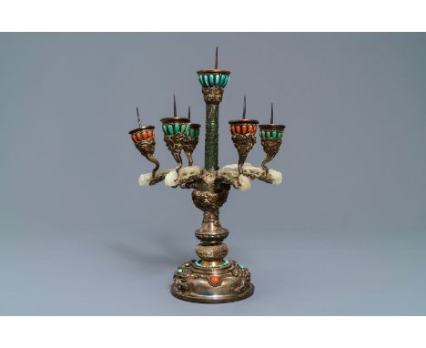 A coral and turquoise inlaid silver and jade candlestick, China or Tibet, 18/19th C. ----- H.: 40,5 cm  -----  Condition repo