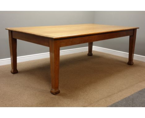 Early 20th century large light oak boardroom/dining table, rectangular moulded top, tapered legs with curved spade feet, 214c