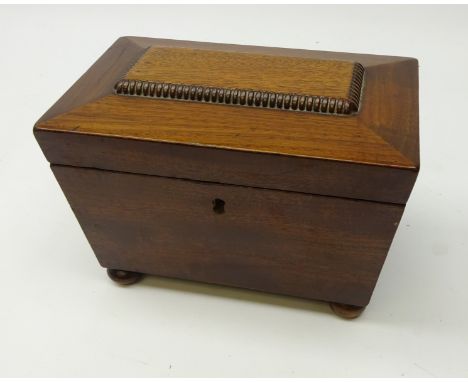 Early 19th century, mahogany, two division tea caddy, on bun feet, W20cm, D12cm, H14cm   Condition Report   Click here for fu