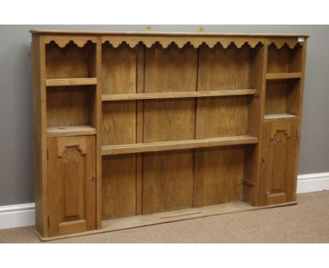 Early 20th century light oak panelled wall hanging plate rack, three tiers and two shelves, two panelled doors, W162cm, H103c