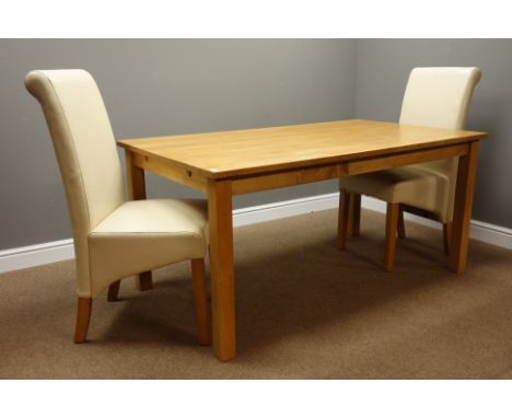 Rectangular light oak dining table (160cm x 91cm, H76cm), and two high back dining chairs   Condition Report   Click here for