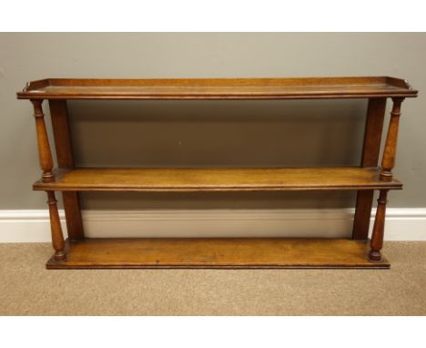 Early 20th century golden oak three tier wall  with turned shelf supports, W107cm, H57cm, D18cm   Condition Report   Click he