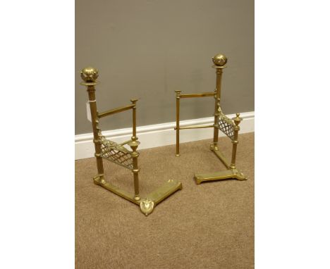 19th century Regency style brass fire dogs, reeded columns with ball and foliage finial, pierced basket weave, floral motifs 