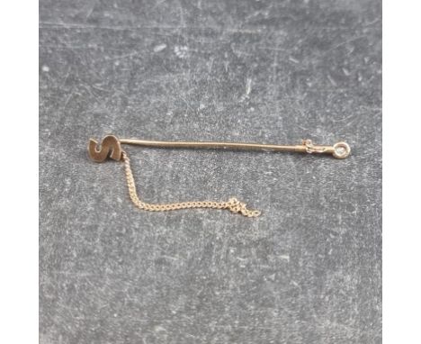 A 9ct gold tie pin, with 'S' terminal, set diamond to securing clip, 55mm.