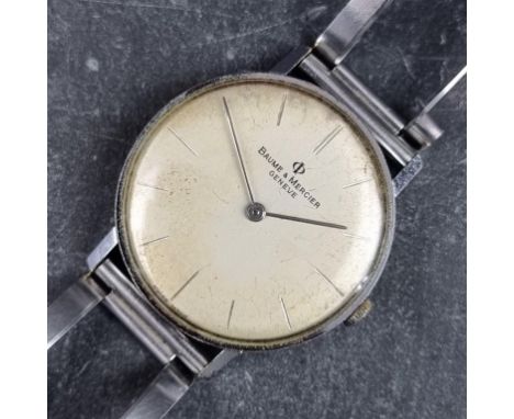 A 1960s Baume &amp; Mercier Geneve stainless steel manual wind wristwatch, 32mm, Ref. 579 729027, on vintage bracelet.