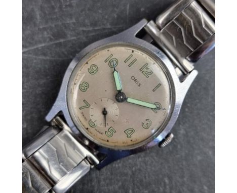 A 1950s Oris stainless steel manual wind wristwatch, 33mm, Cal. 461, on later expanding bracelet.