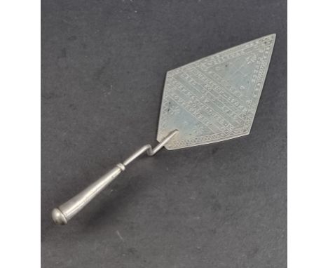 (SJM) A small white metal trowel, inscribed 'Seccondee Weslyan Church Foundation Stone, Laid 31.3.1914, By John Maxwell…’, 16