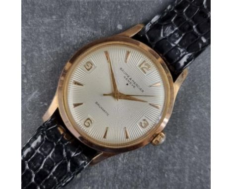 A late 1950s Baume &amp; Mercier 'Baumatic' stainless steel and gold plated automatic wristwatch, 33mm, Ref. 601078 2116, on 