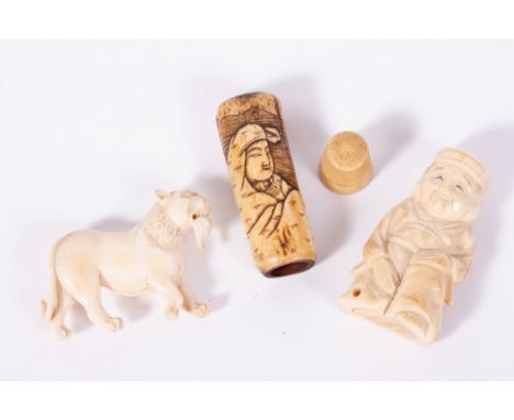 A 19TH CENTURY CARVED IVORY NETSUKE  in the form of a kneeling man; a 19th century Oriental carved ivory lion and a carved bo