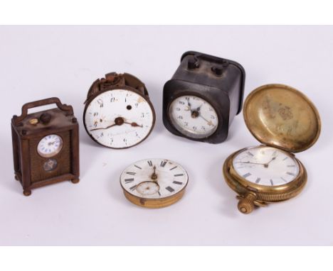 A MINIATURE CARRIAGE TYPE TIMEPIECE OR CLOCK with a Swiss eight day watch type movement and visible escapement, 6.5cm high wi