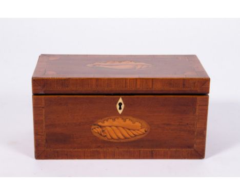 A GEORGE III WALNUT AND SATINWOOD CROSSBANDED TEA CADDY with shell inlay decoration, 26.5cm wide x 13cm deep x 13cm high Cond