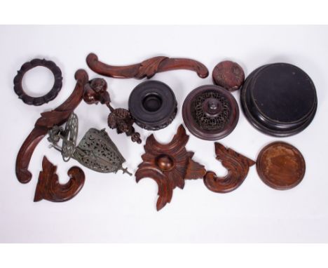 A COLLECTION OF ORIENTAL HARDWOOD STANDS  and pot lids together with an Eastern cast metal hanging lamp and furniture element