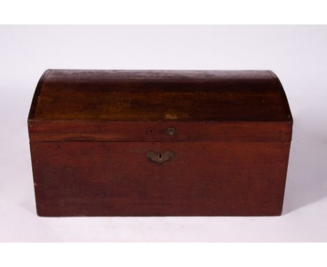 AN ANTIQUE COLONIAL HARDWOOD DOMED TOPPED TRUNK with brass handles, 87cm wide x 44cm deep x 42cm high At present, there is no