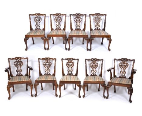 A SET OF NINE CHIPPENDALE STYLE MAHOGANY DINING CHAIRS with upholstered inset seats to include two carvers, carvers 68cm wide