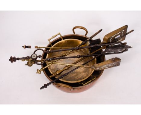 A 19TH CENTURY COPPER JAM PAN with looping handles, 46cm wide together with a brass jam pan, 42cm wide and seven miscellaneou
