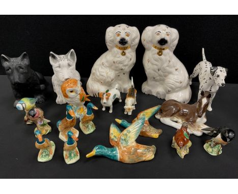 Beswick animals including - pair of Staffordshire type dogs, 20cm high, Arnoldene Dalmatian dog, owl, birds; etc.