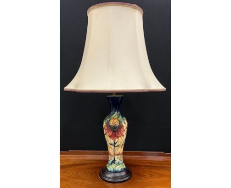 A Moorcroft Anna Lily pattern baluster-form table lamp, 43cm high (65cm high with shade).