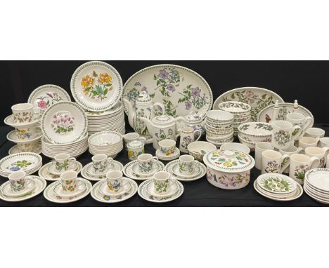 An extensive Portmeiron Botanic Garden table service including; a coffee pot, tea pot, chocolate pot, lidded tureen, twenty f
