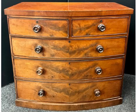 A Victorian mahogany bow front chest of drawers, two short over three slightly graduated long drawers, plinth base, 95cm high