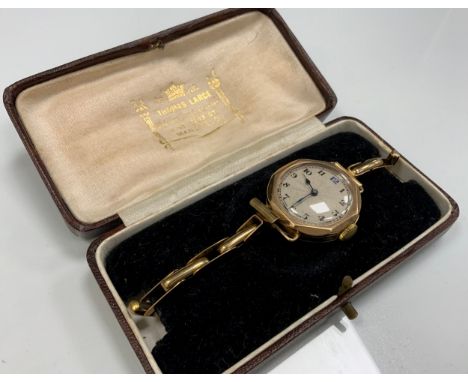 A lady's 9ct gold cased Visible wristwatch, silvered dial, Arabic numerals, Birmingham 1926 import marks, associated 9ct gold